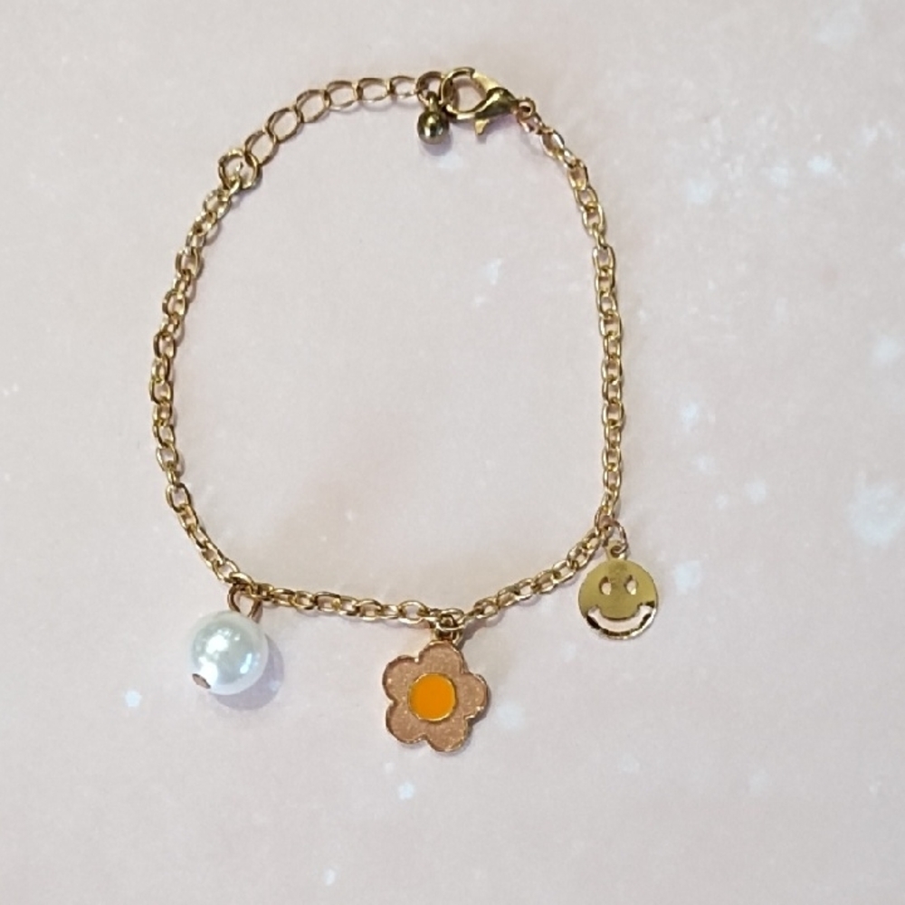 Gold Tone Metal Flower, Faux Pearl And Metal Smiley Face Charm Bracelet Lobster